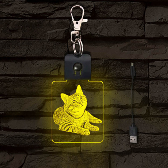 Fekvő cica világító LED-s kulcstartó