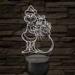 Grincs ajándékos zsákkal – 7 színű, színváltós 3D LED lámpa